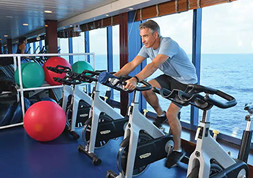 vista-life-on-board-tile-736×520-fitness-center-cycling